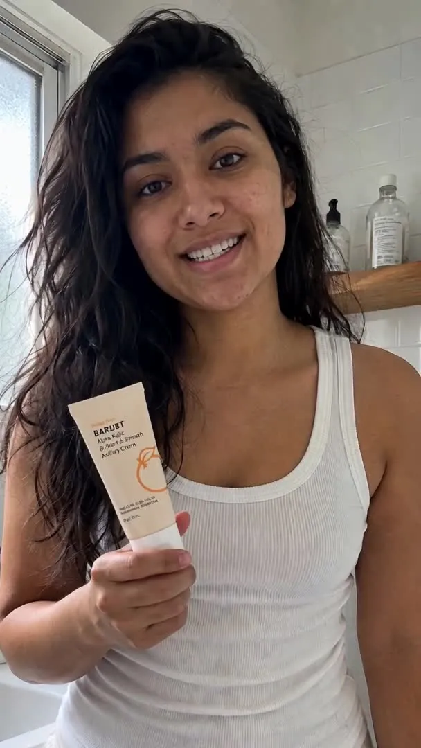 Applying brightening cream to the underarm area
